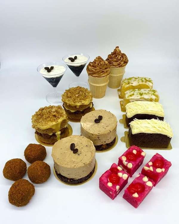 Their mini-cake selection Biscoff truffles, spiced apple and custard brown sugar cakes, cappuccino cheesecakes, very cherry blondies, sticky gingerbread with salted caramel buttercream, zingy lime drizzle, Biscoff cake cones, and Espresso martini cakes.