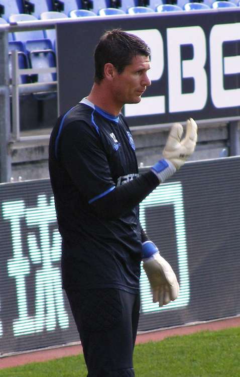 Mike Pollitt warming up for the Premier League game Wigan Athletic v Bolton Wanderers in October 2011. (Image - CC 2.0 Dan Farrimond Unchanged bit.ly/3AiP3jG)