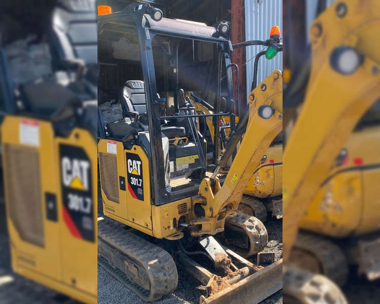 Macclesfield: Do you see this digger, which weighs almost two tonnes, being loaded onto a vehicle in Macclesfield?