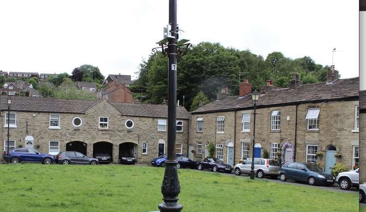 Macclesfield: Old character properties on The Green, Bollington.