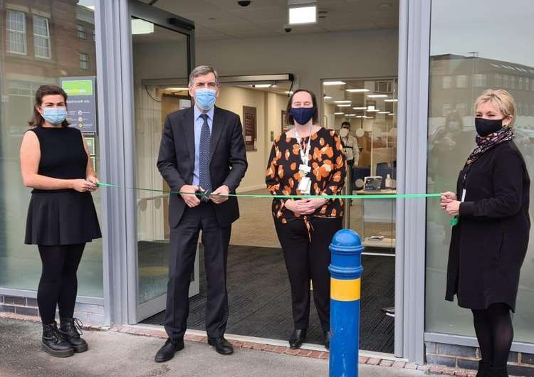 Two work coaches and next to the Minister is Sue Nixon (centre-right) Senior Leader for Cheshire joined Mr Rutley (centre-left) in cutting the ribbon.