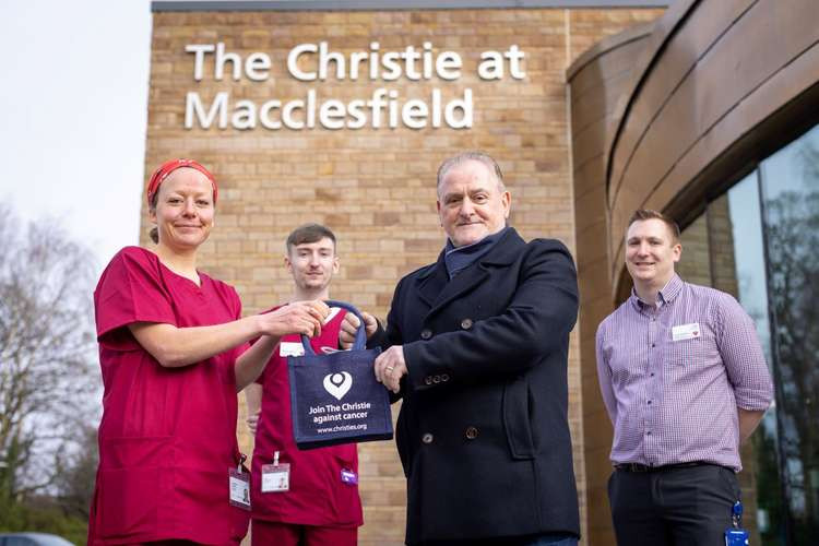 Radiographers Liz Reeves and Samuel Johnson with Thomas Walker and lead radiographer James McGovern celebrate another treatment milestone at Macclesfield's The Christie centre.