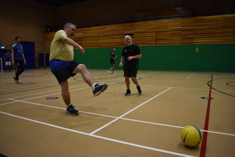 Accurate passing to other walking players is vital - demonstrated here by John Place.