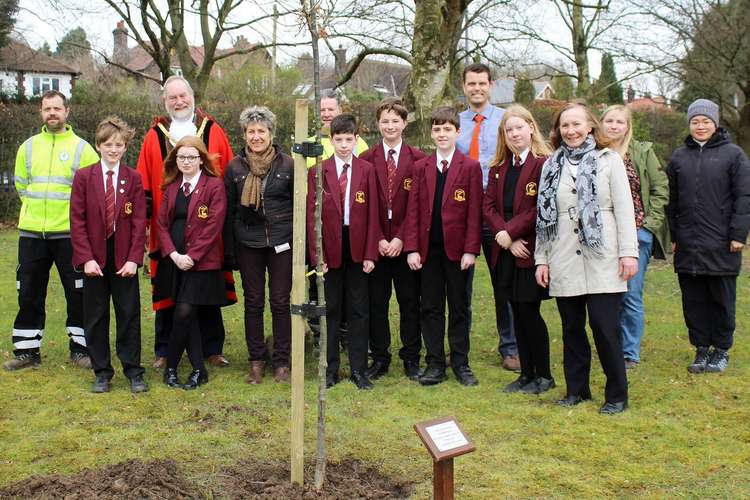 The Mayor of Macclesfield David Edwardes with staff and students, behind the new tree.