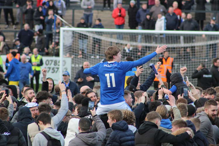 LAST SATURDAY: Macclesfield FC were only 1-0 up at half-time in their crucial promotion match, but scored three more goals after Carl Davenport appeared on the pitch at half-time. Pictured: James Berry celebrates with fans at full time.