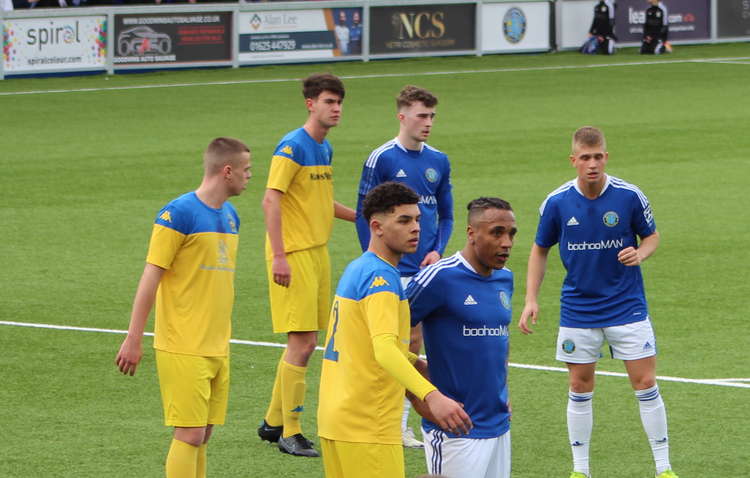 Macclesfield FC's Neil Danns (bottom in blue) could gain two more international caps over the next few days.