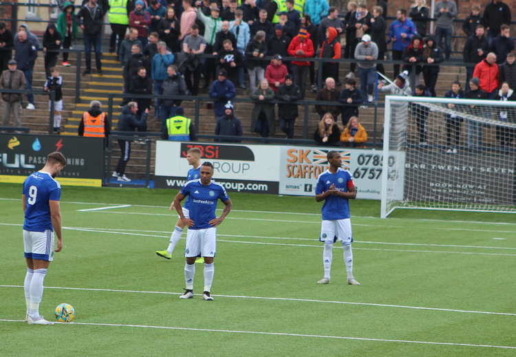 Neil Danns (centre) awaiting kick-off at the Leasing.com Stadium.