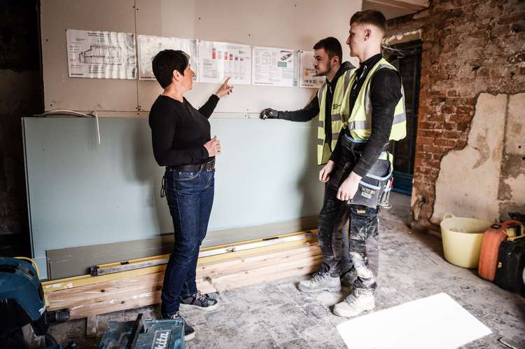 Cathy discussing the scheme details with team members Tom and Jake. (Image - Fiona Bailey Photography)