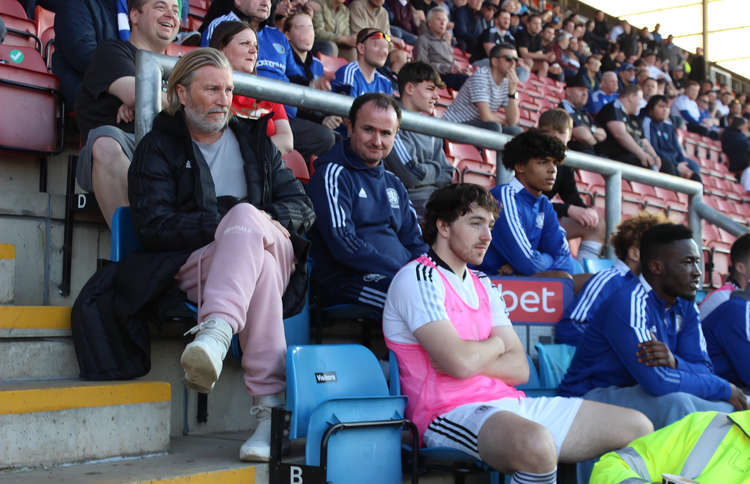 Macclesfield FC Director of Football Robbie Savage and co at half-time. (Image - Alexander Greensmith)