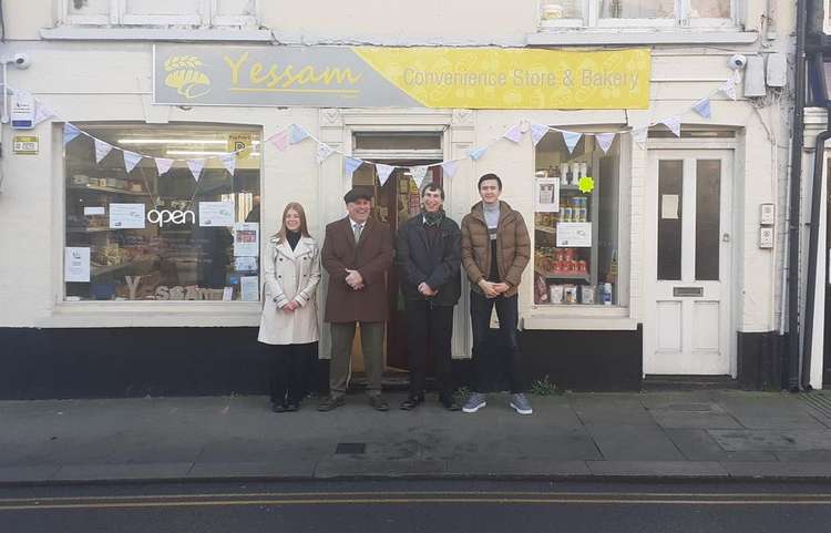 (L-R) Plume Academy head girl Maisie Shorney, principal Carl Wakefield, Yessam owner Edward Massey and deputy head boy Charles Brunt at the shop's official opening