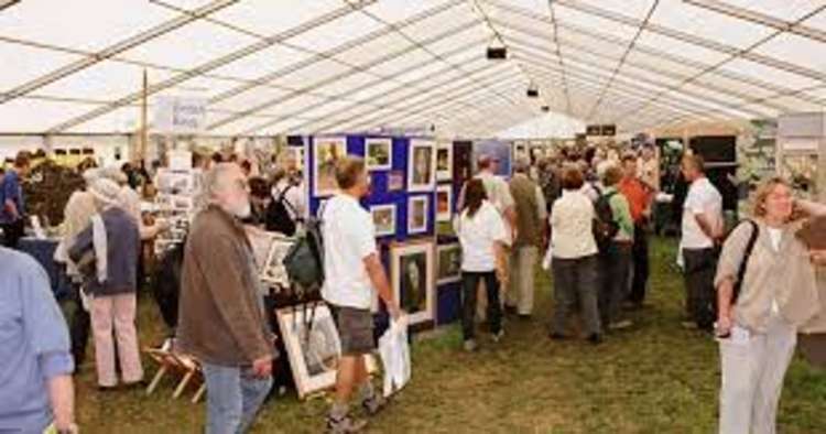 Stalls and visitors attending previous Birdfair events