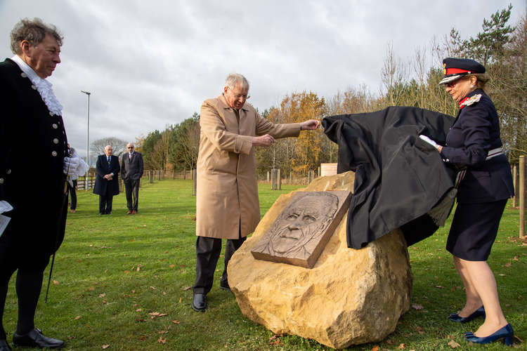 HRH and Lord-Lieutenant Sarah Furness revealing a commemorative plaque to mark the visit and recognise the Memorial Orchard's contribution to The Queen's Green Canopy initiative