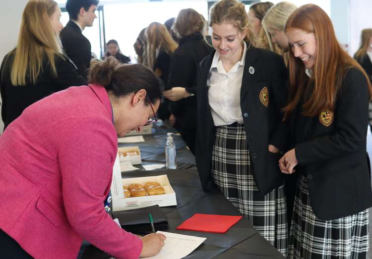 Students purchasing doughnuts to raise funds (image courtesy of Oakham School)