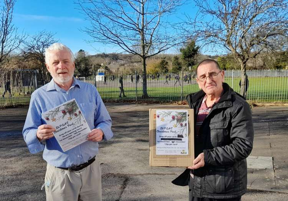 Chair of library trustees Chris Franks and Malcolm Phillips distribution mastermind