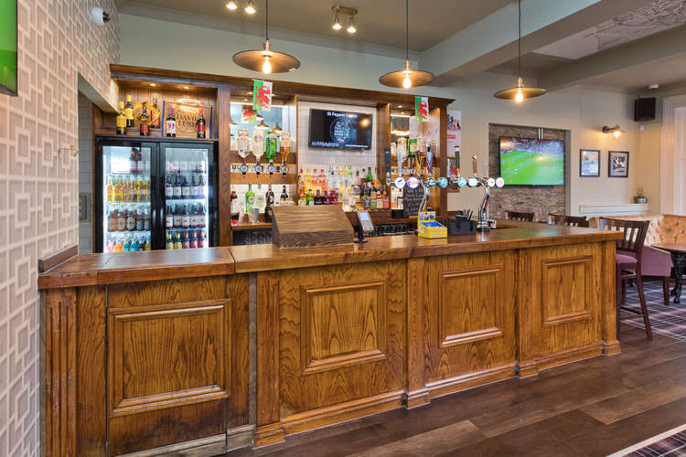 Beer and ales such as Doom Bar, Carling, and Strongbow are displayed at the bar. (Image credit: Craft Union Pub Company)