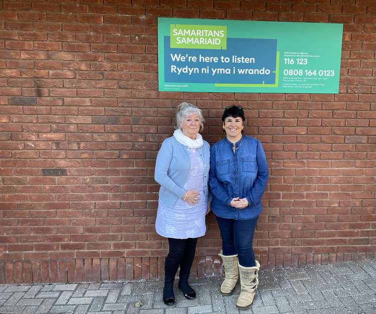 Carole Anne Dacey (L) with Alison Boniface, branch director at Cardiff and District Samaritans in Ely. (Image credit: Jack Wynn)