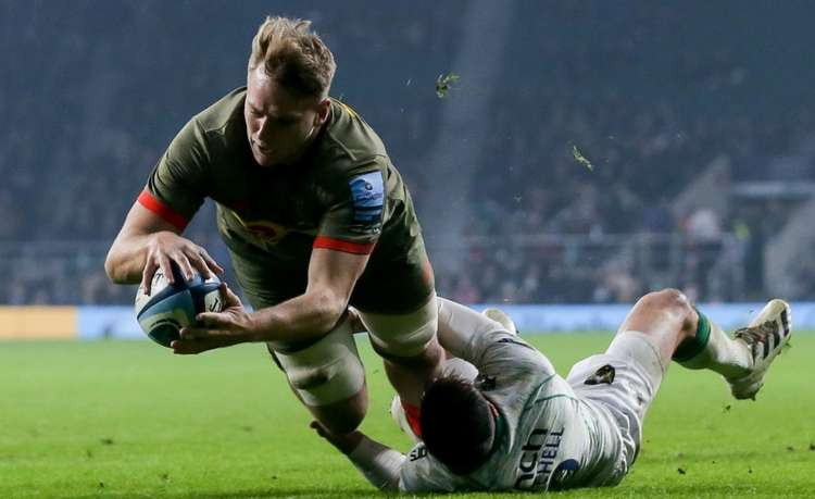 Number eight Alex Dombrandt was the man to go over in the left corner for the first of his hat-trick scores for the day after finding a gap in the fringes of Saints' defence. Credit: JMP/Juan Gasparini for @harlequins.