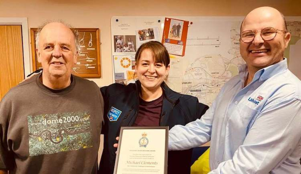 Teddington and Twickenham RNLI Souvenirs secretary Mike receives his volunteering award