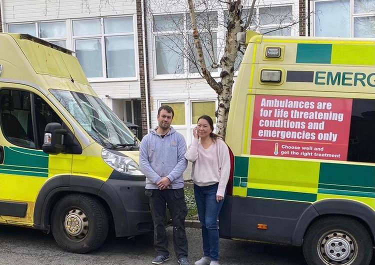 Alexandr pictured with the restored ambulances before his trip.