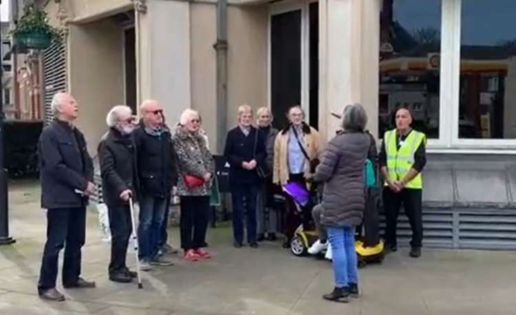 A volunteer choir today brought their voices and support to volunteers collecting humanitarian aid for Ukraine.