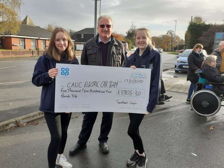 Cate Rook, Jeff Davies and Phoebe Fogg from Sandbach High School and Sixth Form College at the presentation