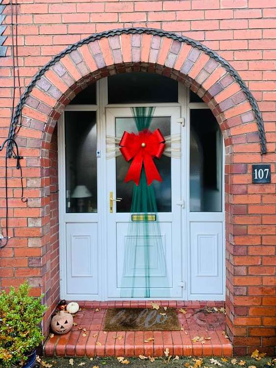 Dressed for Christmas - front door decorated by Abigail