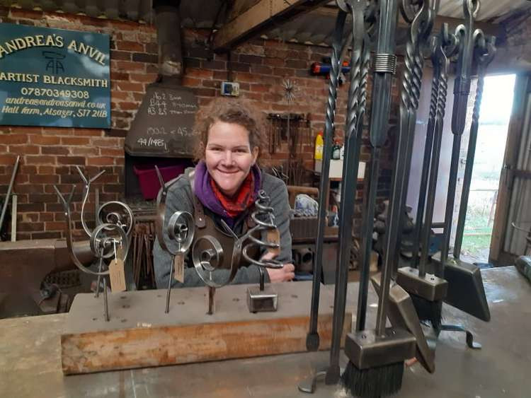 Andrea in her Alsager forge with some of her work