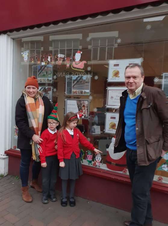 Laura with her son and daughter who painted some of the display along with Northwood Sandbach manager, Andrew Heath