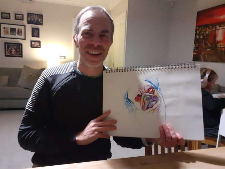 Paul Benbow with some of his artwork