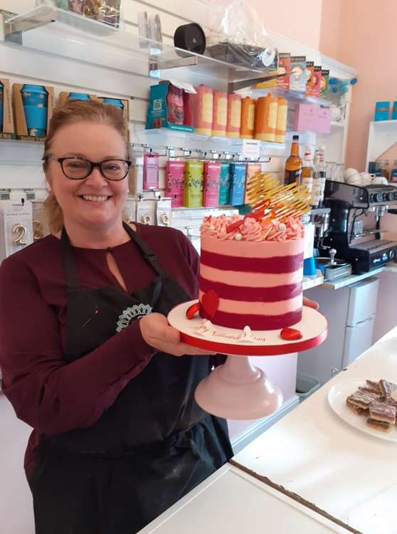 Debbie Fenton with the ultimate cake at  Lois's Little Cake & Chocolate Company