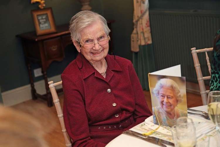 Kathleen with her birthday card from the Queen.