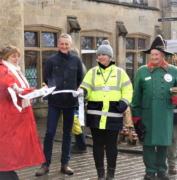 Left to right: Cllr Ros Wyke, Leader of Mendip District Council; Stuart Brown, Chief Executive Officer; Haylee Wilkins, Assistant Chief Executive Officer and Head of Services for Neighbourhoods and Wells Town Crier Len Sweales at the last Christmas market