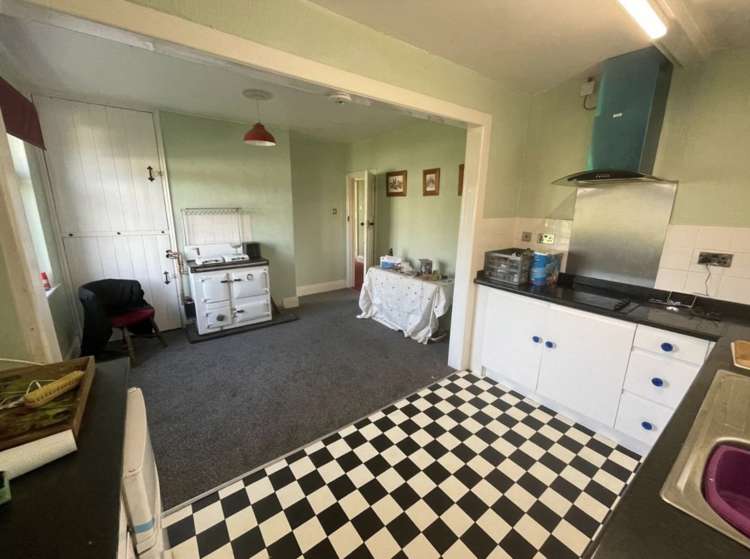 There is a spacious kitchen/dining room