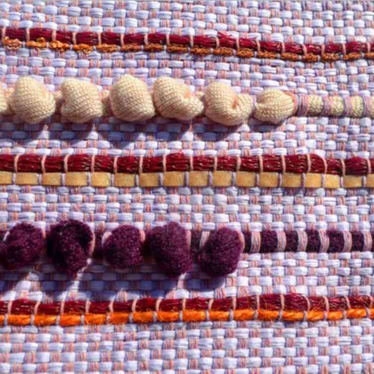 One of Phoebe's weavings, featuring colours based on the houses in Burano, Italy.