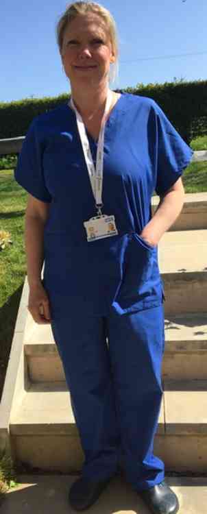 Emma Mallett in scrubs made by Millfield staff and students