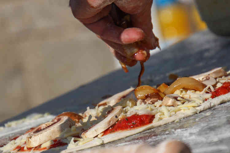 Pizza making in progress