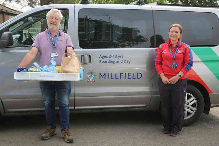 Millfield's security manager Sarah Tucker with staff member Martin Case loading deliveries