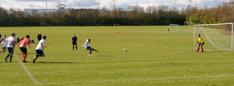 Lewis Crawford grabs his first ever Woolverstone goal (Picture credit: Nub News)