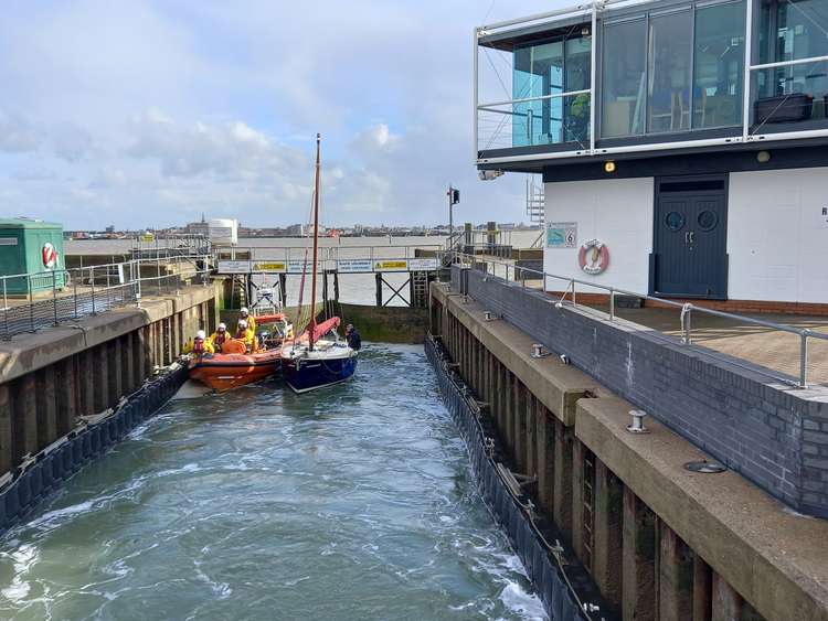 RHS Howe safely at Shotley marina with RNLI crew