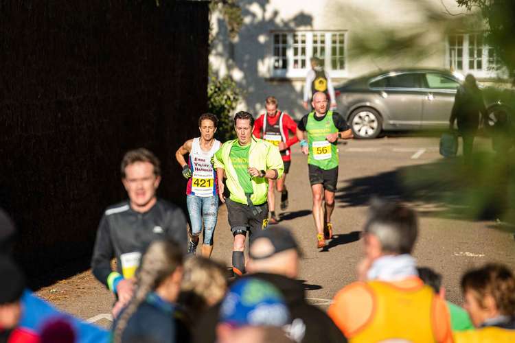 Mark Andow and Ross Walton crossing the line. Credit: Kyle Baker Photography