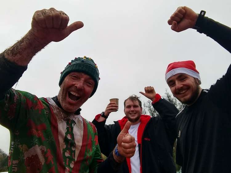 Soggy, muddy but smiling Adrian Horne, Kyle Baker and Ollie Goodchild-Horne celebrate