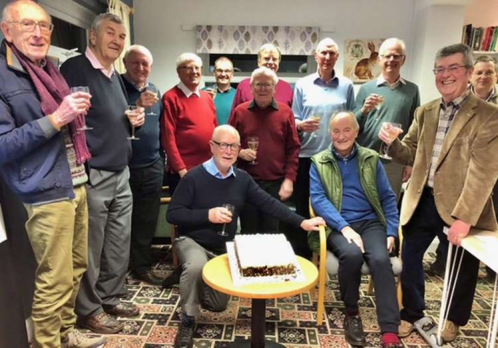 Members of the Hopeful Volunteers celebrate the club's 21st birthday