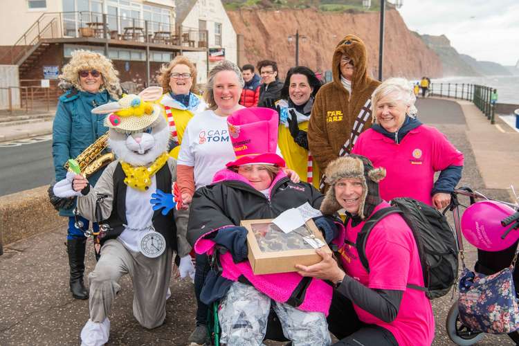 Charlotte Reid, centre, during a previous Sidmouth Does Wear a Hat Week charity walk