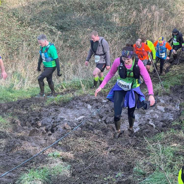 Rachel Barnard enjoying the mud.