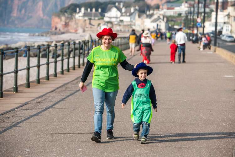 Carol Hounsell and son Harry striding out