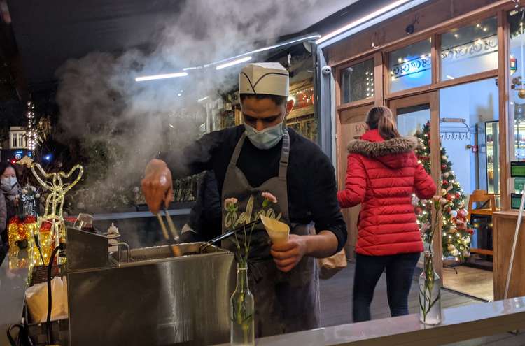 On neighbouring Church street, Sidra chefs entranced with live cooking (Image: Ellie Brown)