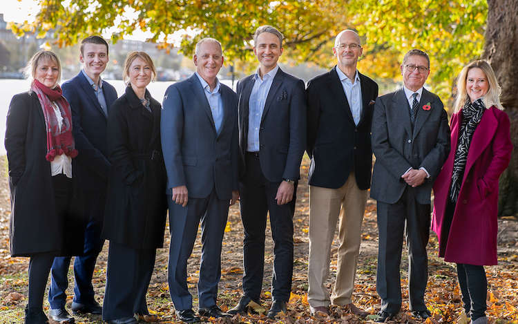 The team at Holland Hahn & Wills pictured by the river Thames at Hampton Wick (Image: Jo Robbens)