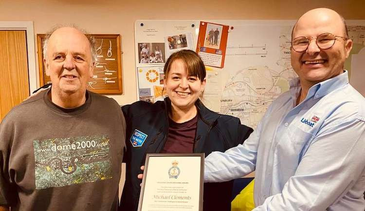 Teddington and Twickenham RNLI Souvenirs secretary Mike receives his volunteering award