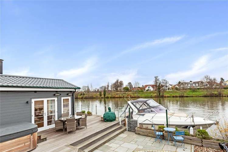 The home comes with two moorings and a separate studio (Image: Savills)