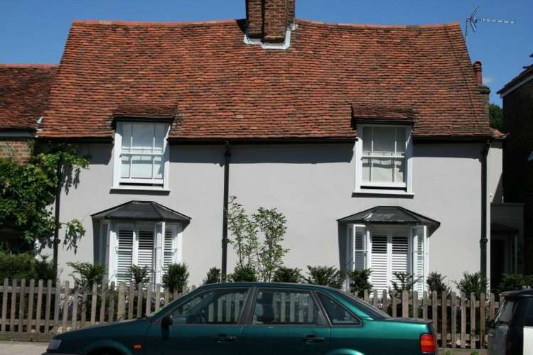 Oak Cottage on the high street, before it was modernised (Image: Historic England)